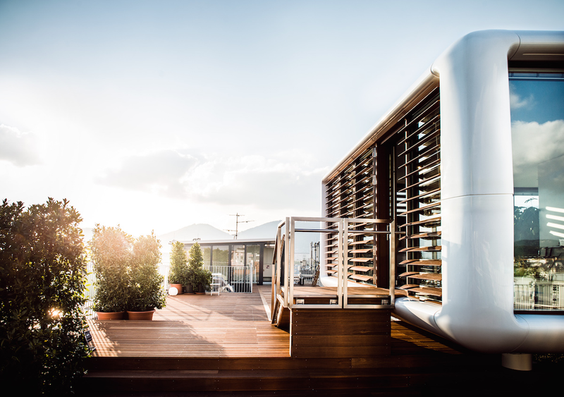 Illustration for article titled This Tiny Hotel Pod Sits on the Roof of a 60-Year-Old Historic Building